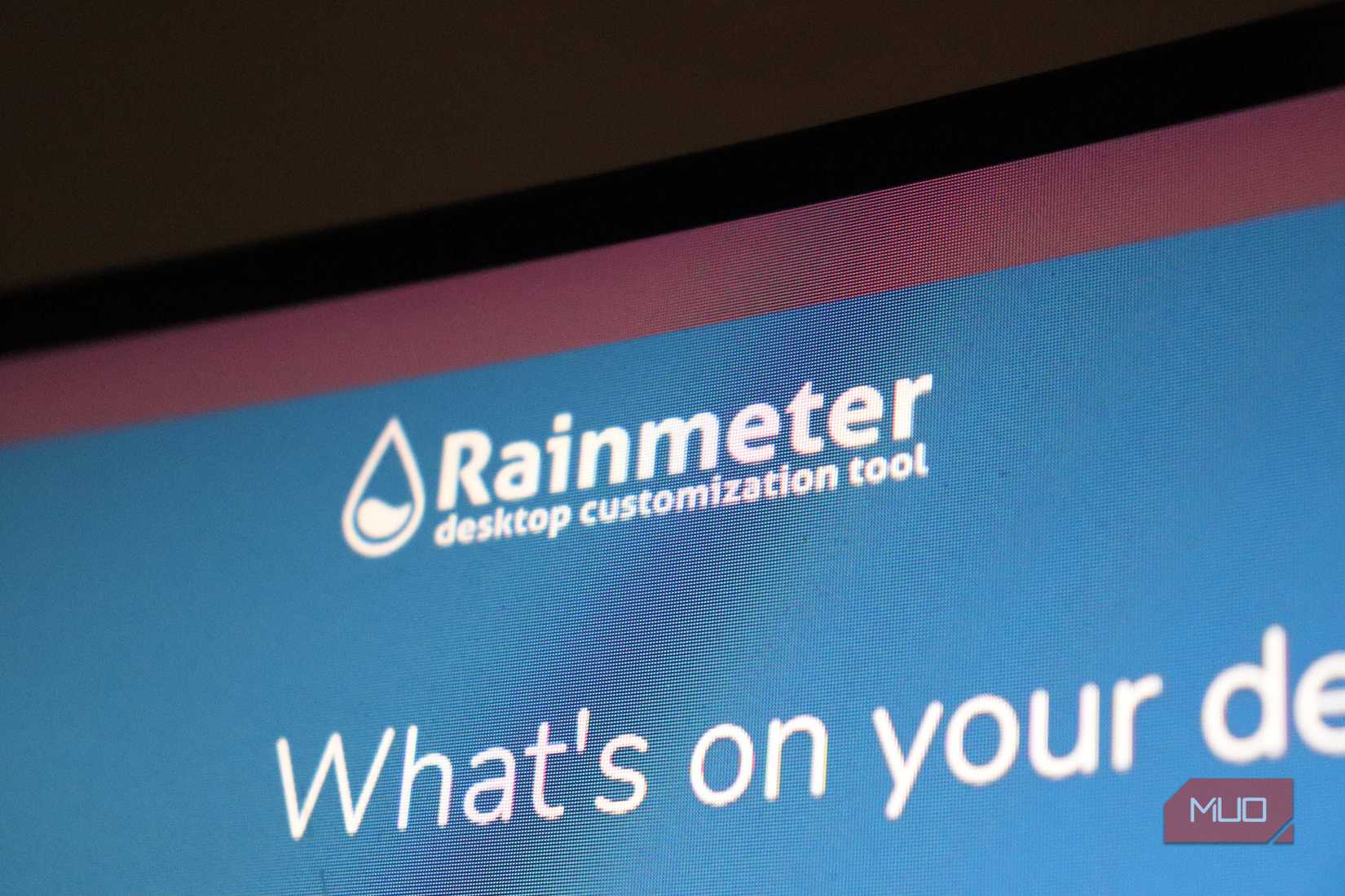 Rainmeter icon on a desktop monitor