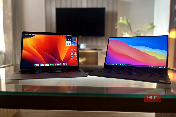 A MacBook Air and a Dell XPS 13 next to each other