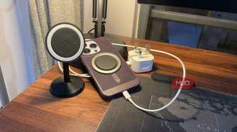 iPhone with a charger and wireless charger