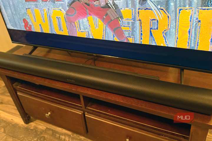 The Sonos Arc Ultra on a TV stand.