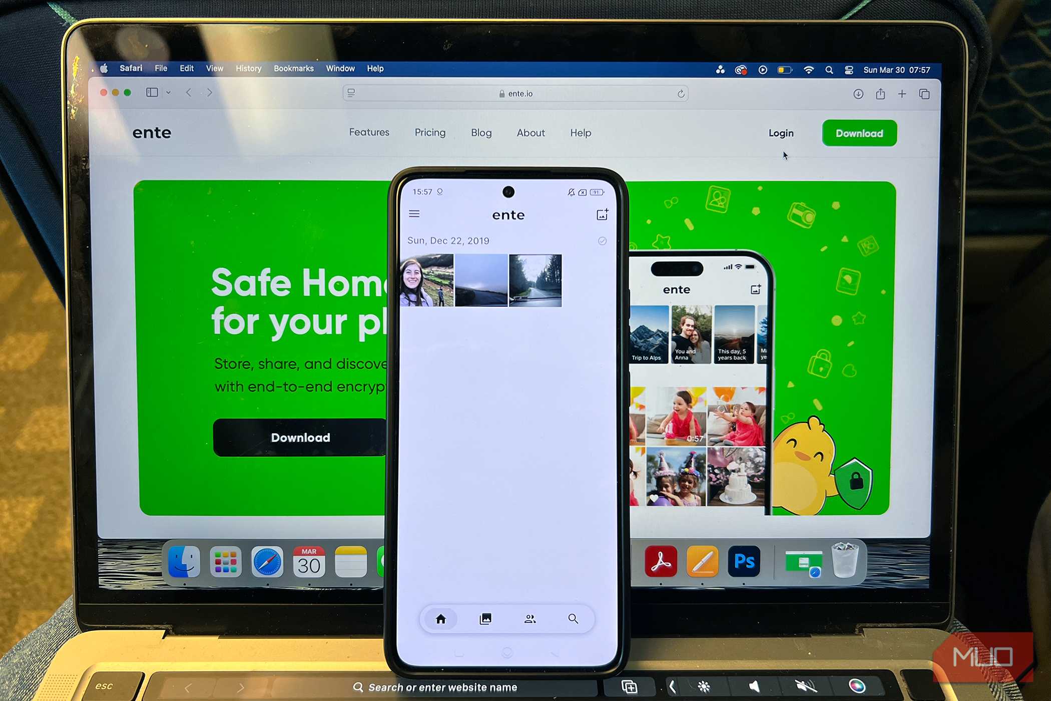 Ente Photos on MacBook with Android Phone Propped on it