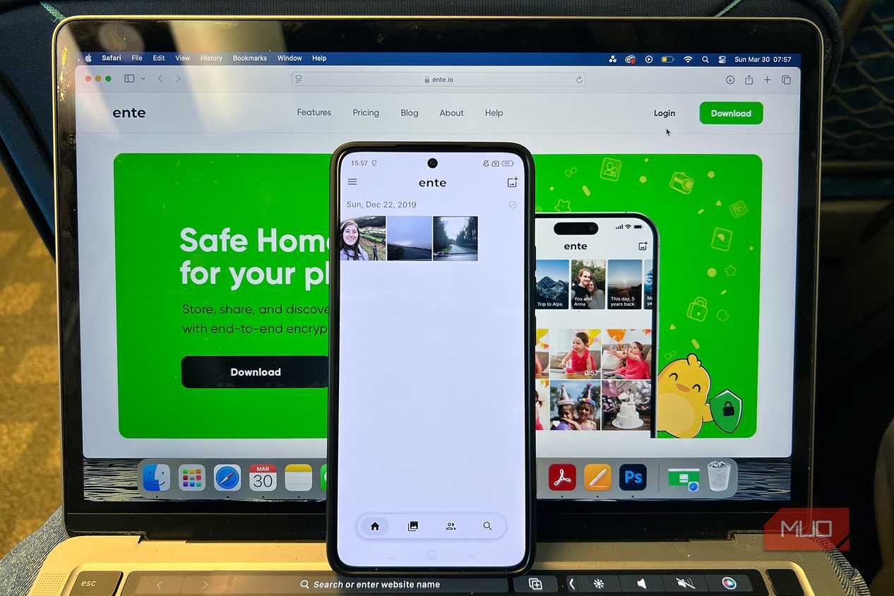 Ente Photos on MacBook with Android Phone Propped on it