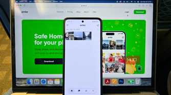 Ente Photos on MacBook with Android Phone Propped on it