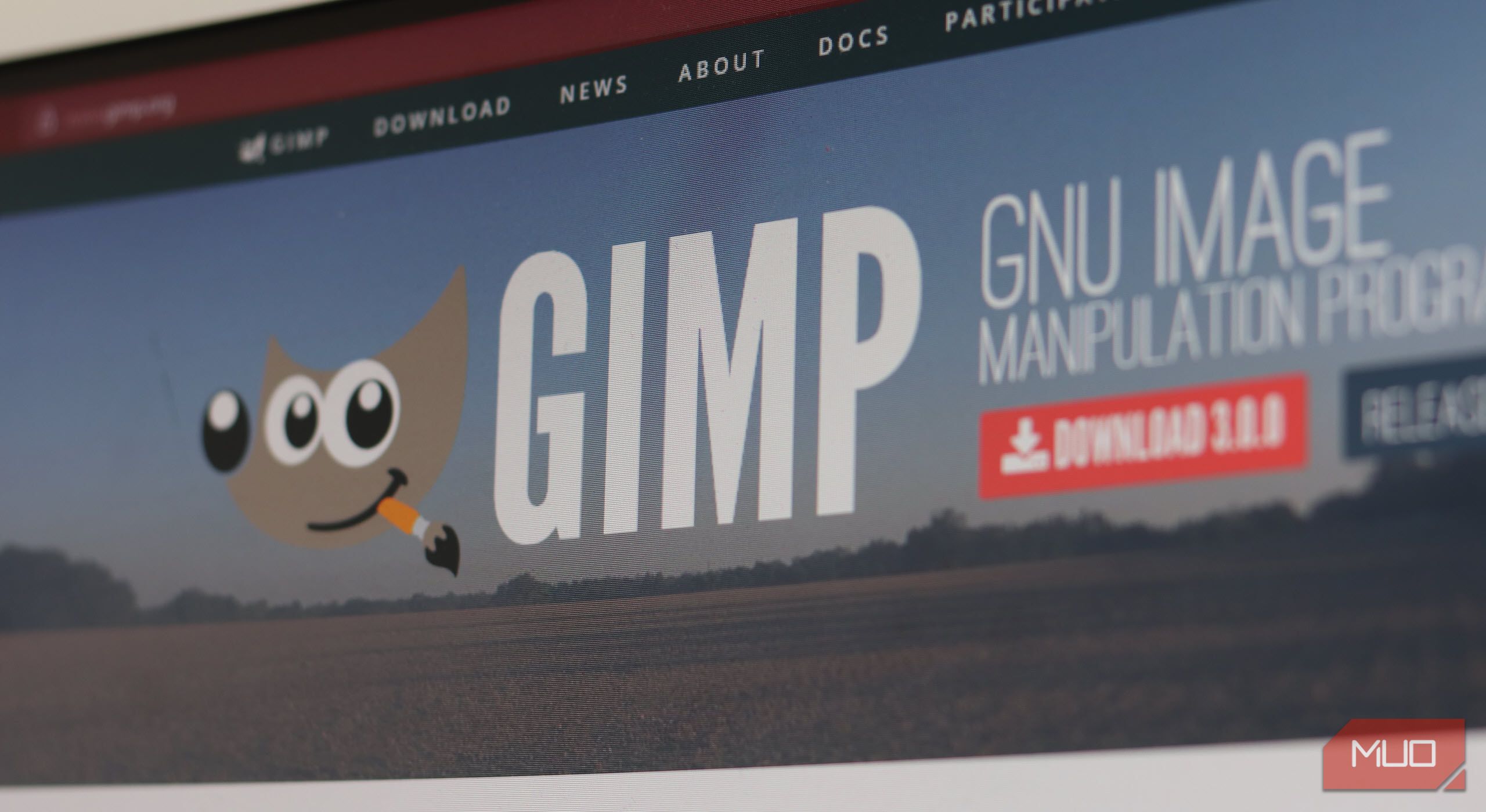 GIMP website on a monitor.