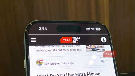 iPhone 16 Pro set vertically on a table running Safari
