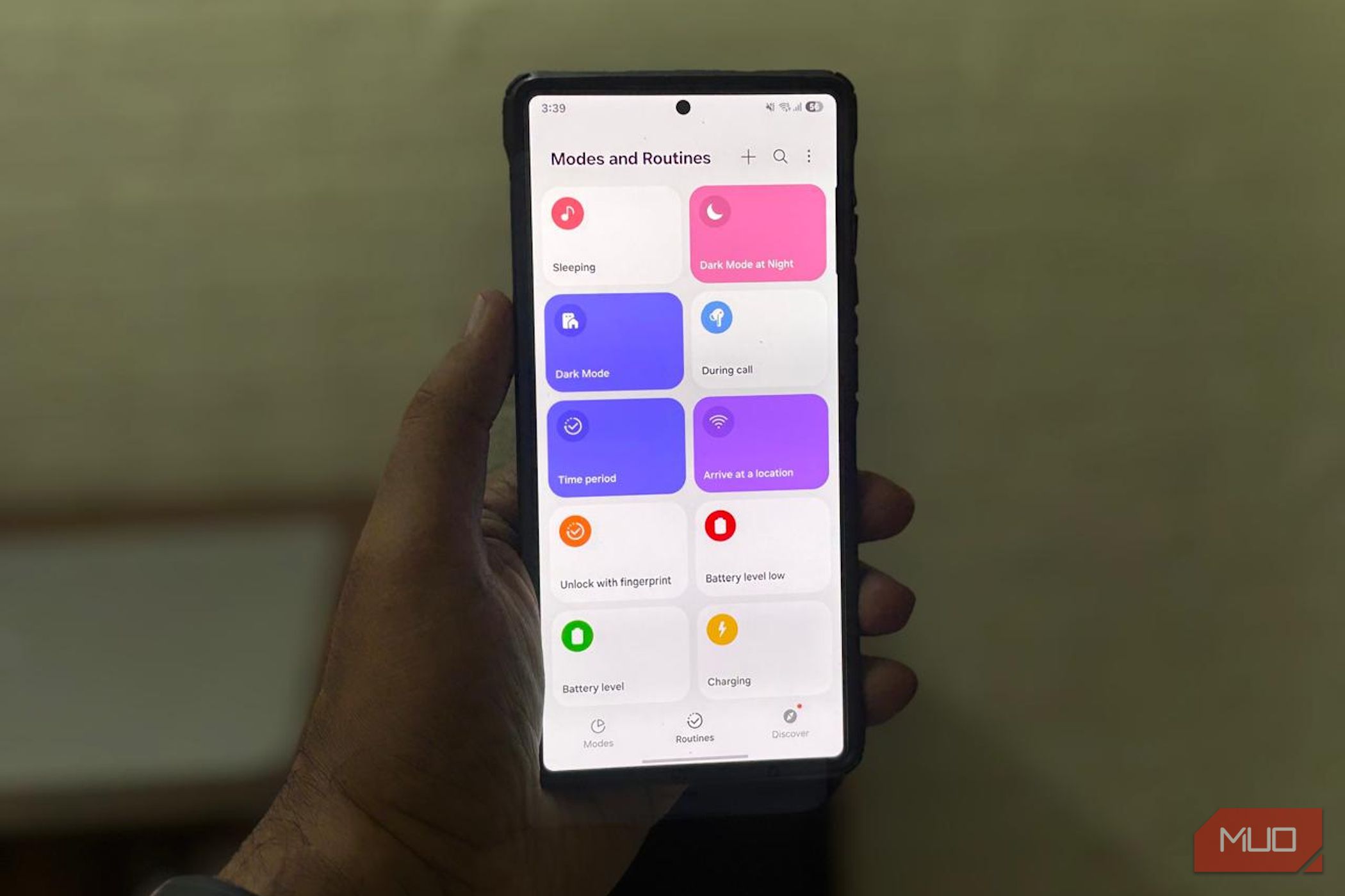 A Samsung S25 Ultra in hand opening routines and modes