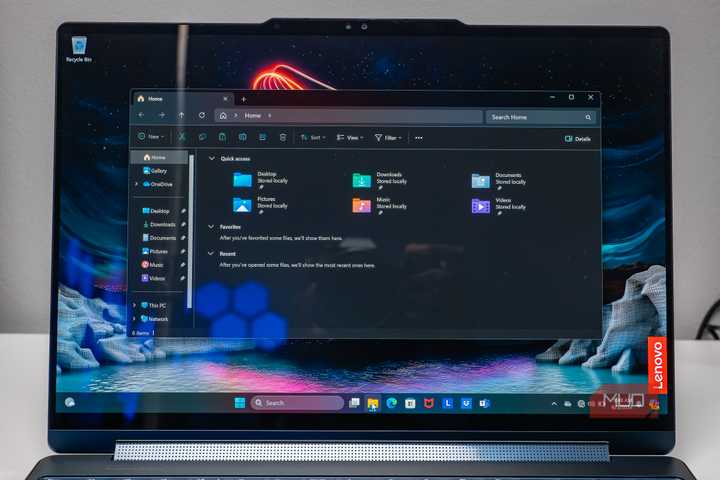 Lenovo laptop showing file explorer in Windows 11.
