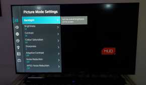 Adjusting picture mode settings on Hisense smart TV.