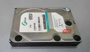 The external hard drive is placed on a desk.