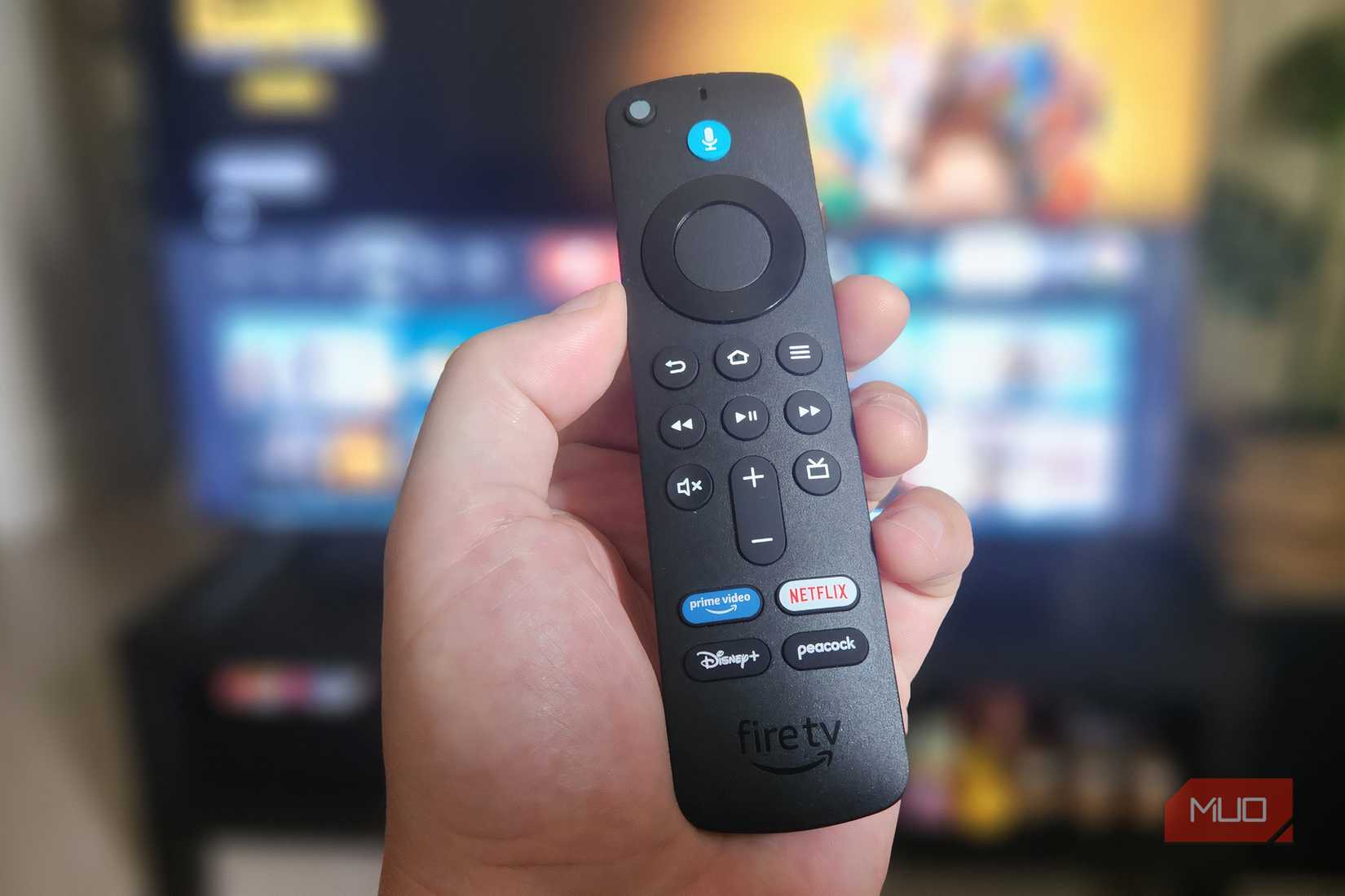 The Fire TV Stick Remote in a hand.
