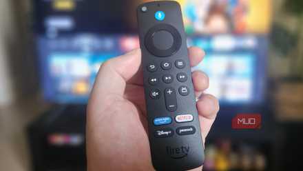 The Fire TV Stick Remote in a hand.
