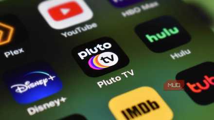 Rows of streaming apps on a smartphone, centered on Pluto TV