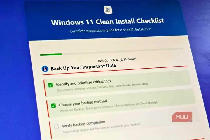 A Windows 11 Clean Install Checklist on a PC monitor
