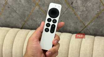 Apple TV remote in hand