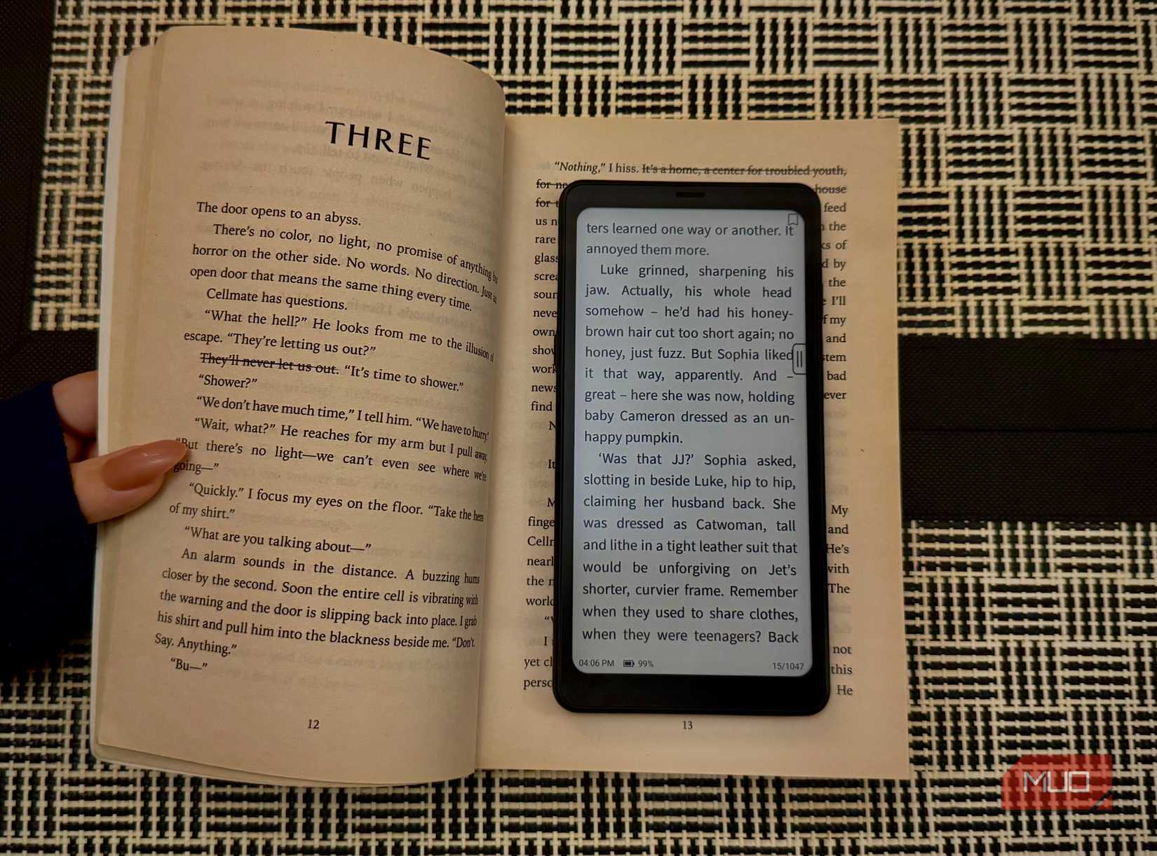 Boox Palma 2 on top of a book