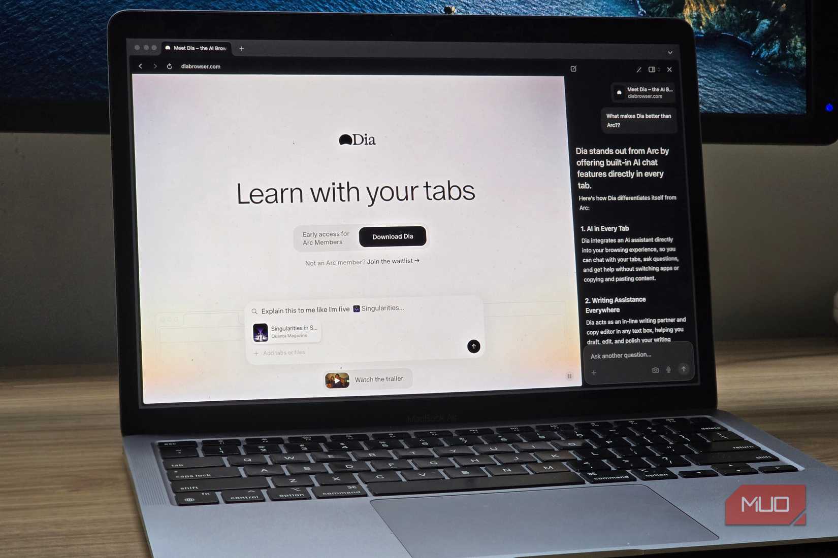Dia browser open on a MacBook connected to a monitor