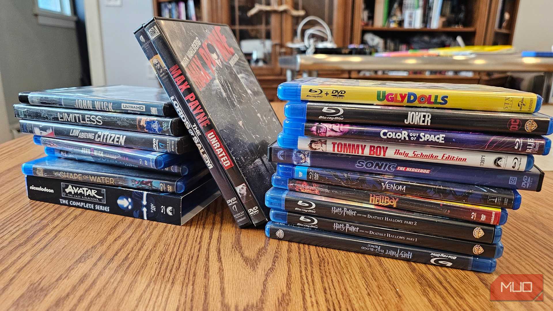 Two stacks of DVDs and Blu-rays