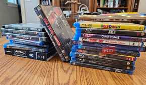 Two stacks of DVDs and Blu-rays