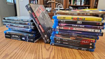 Two stacks of DVDs and Blu-rays