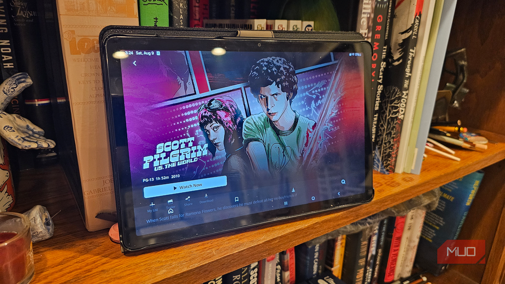 A Samsung tablet on a bookcase opened to the movie Scott Pilgrim vs the World on HBO Max