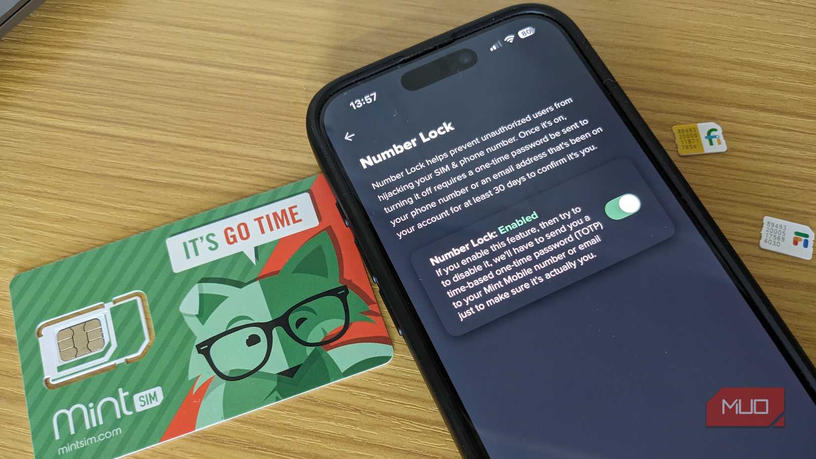 Mint Mobile SIM Protection Number Lock with SIM cards on table