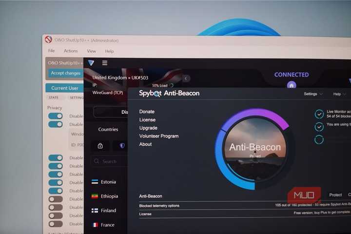 O&O ShutUp10++, ProtonVPN and Spybot Anti-Beacon opened on a Windows desktop.