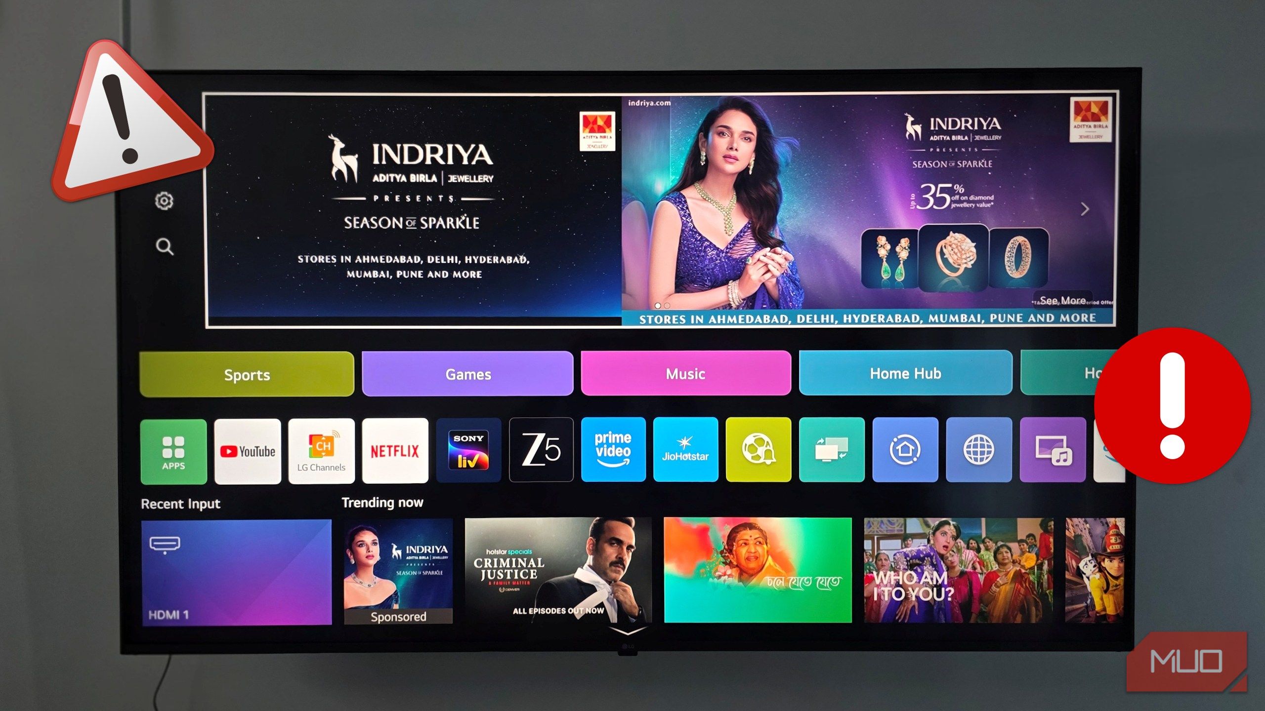 The LG Smart TV is mounted on the Wall.-1