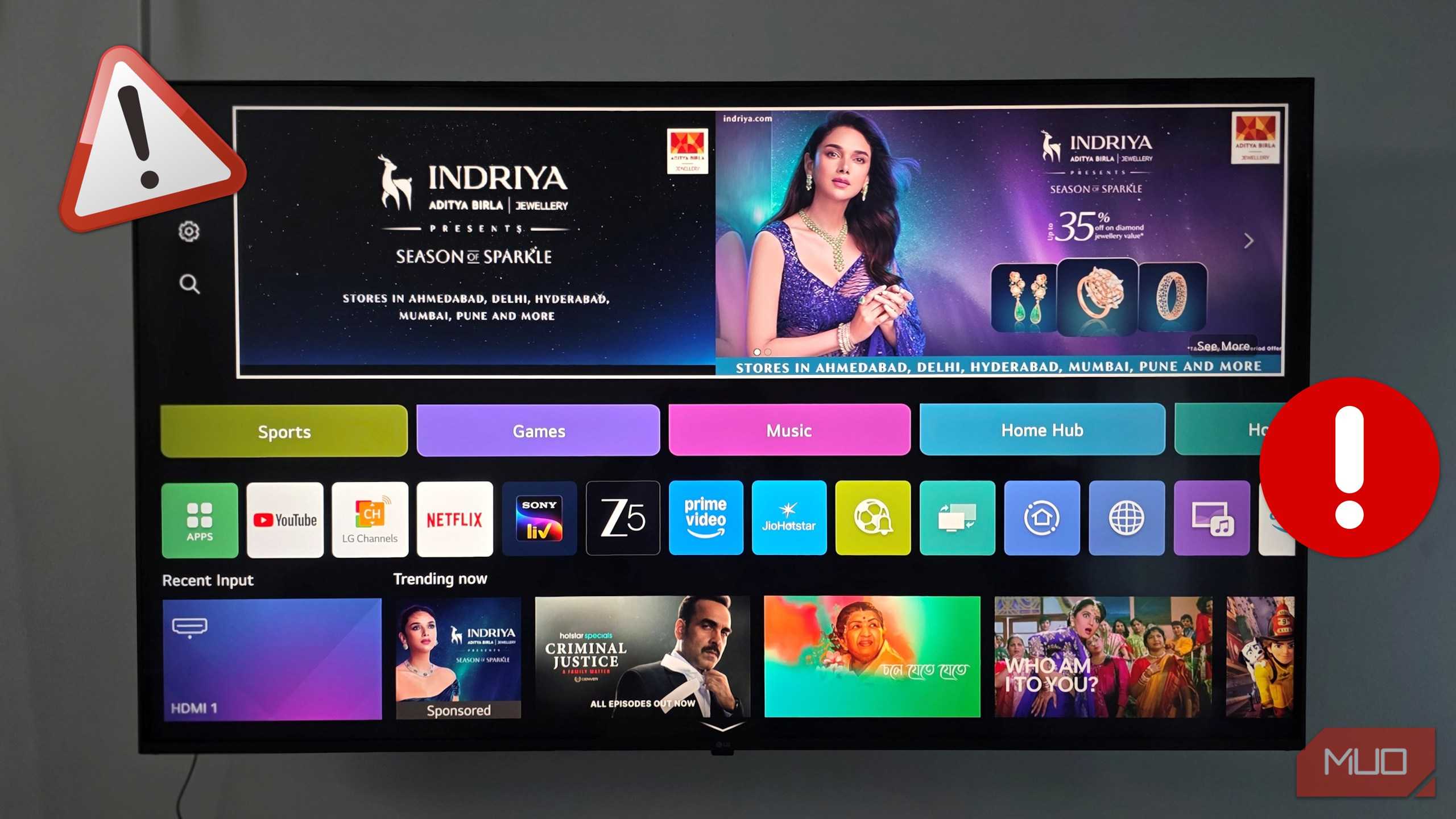 The LG Smart TV is mounted on the Wall.-1