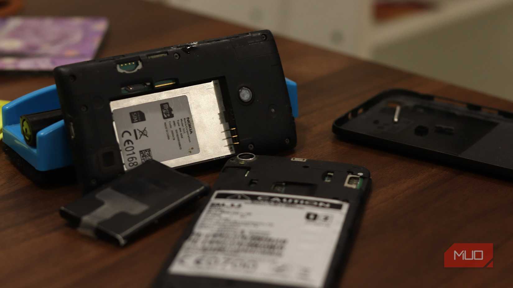 Two Windows Phones with back covers removed. 