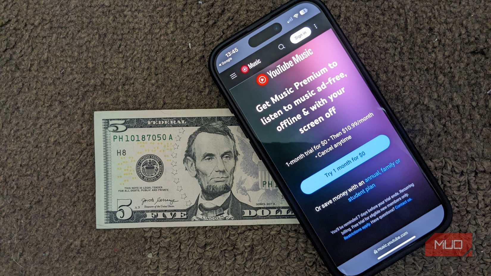 YouTube Music Subscribe Page With US Five-Dollar Bill Underneath