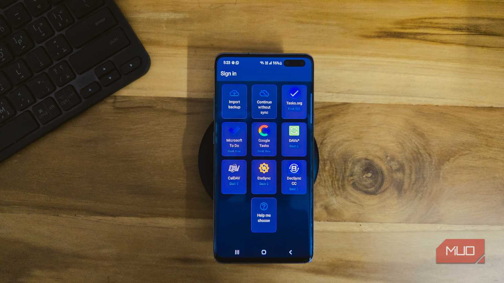 Tasks-org welcome screen open on a Galaxy S10 Plus kept on a wooden table