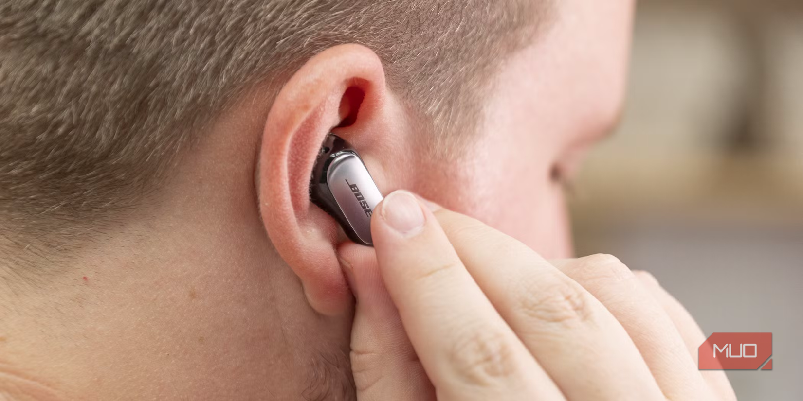 A person wearing in the right ear.