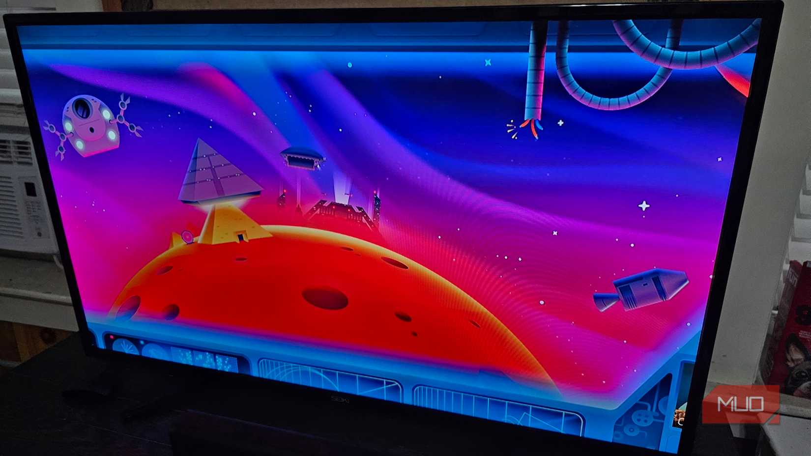 A science fiction screensaver on a television while a Roku device is idle.