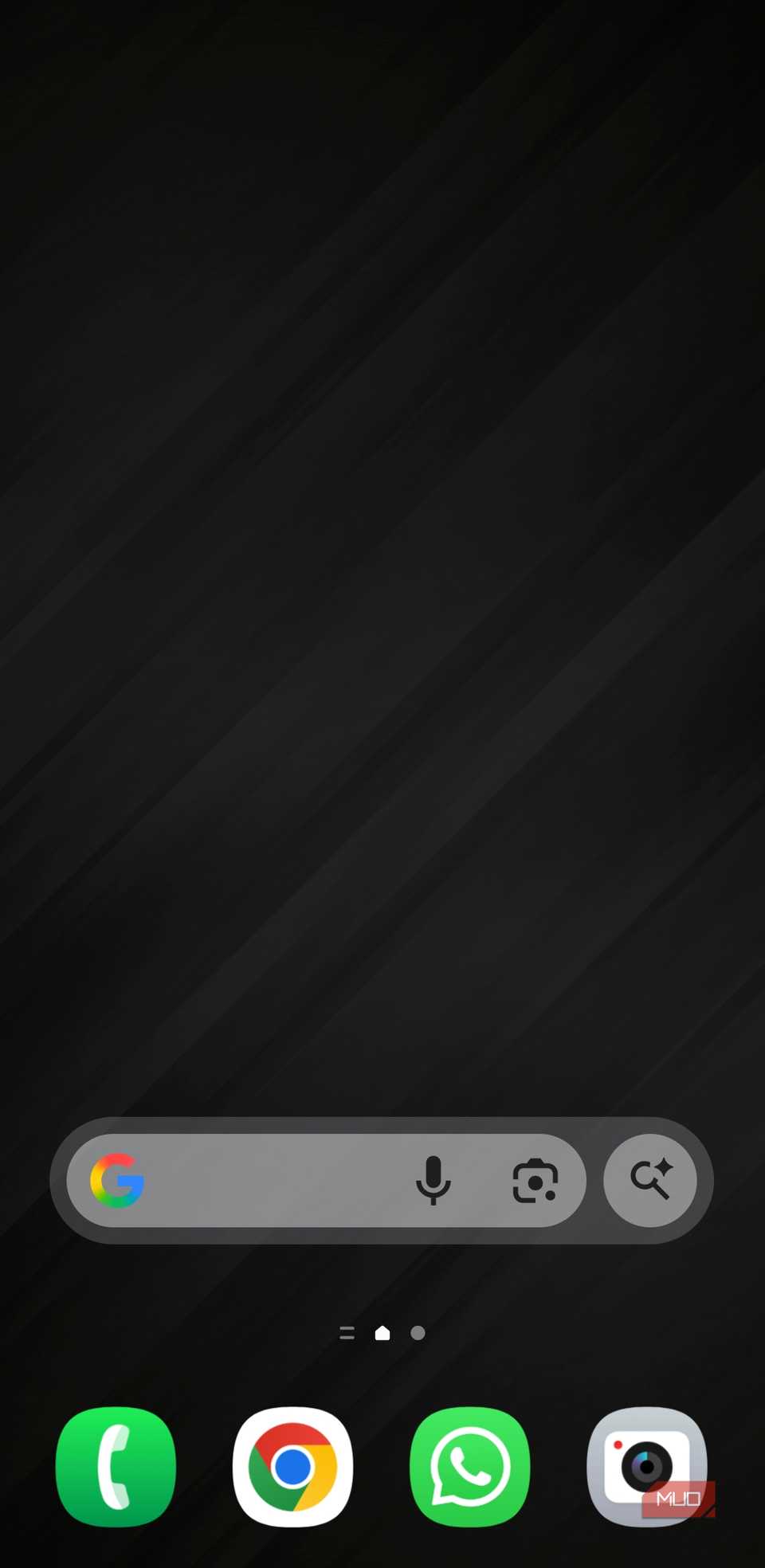 Android phone home screen with black wallpaper