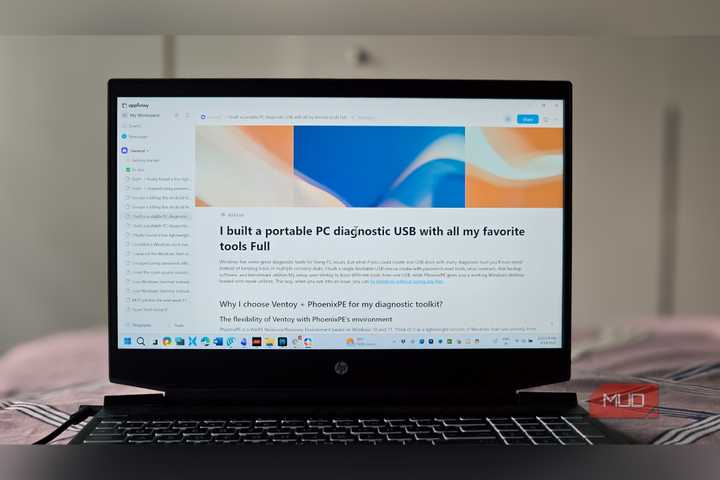 AppFlowy open on a HP pavilion gaming laptop kept on a bed