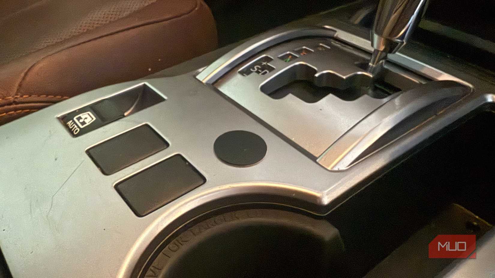 black nfc tag on car center console-1