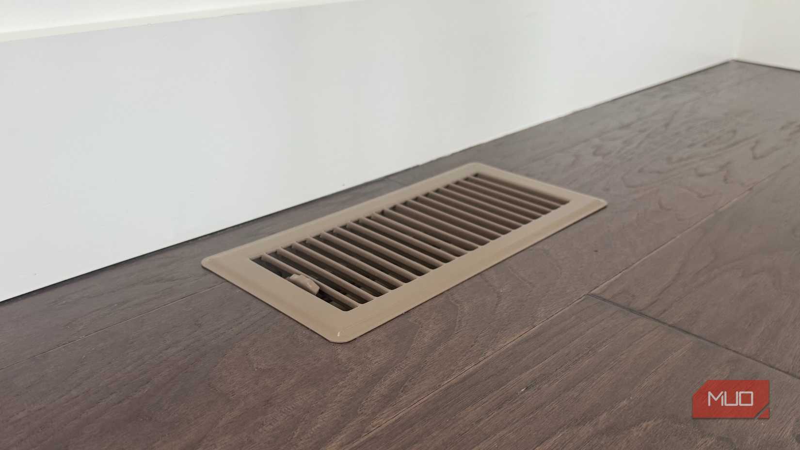 brown floor air vent on wood floor