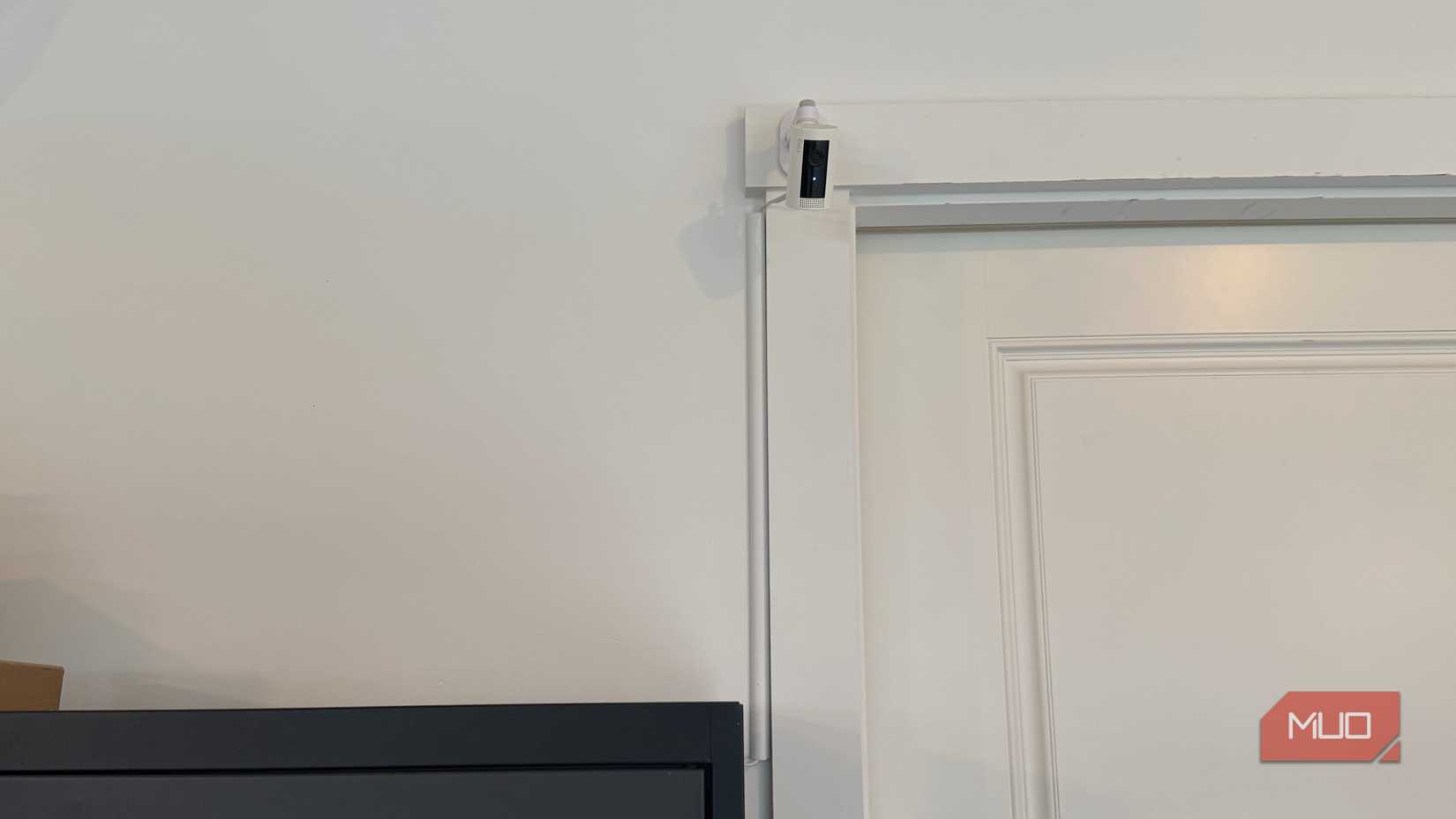 D-line cord hider enclosing Ring camera cable along door trim