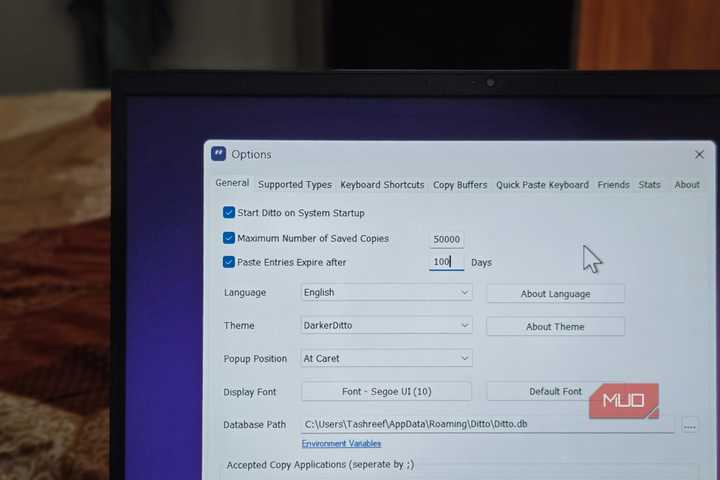 Ditto settings dialog open on a HP pavillion laptop