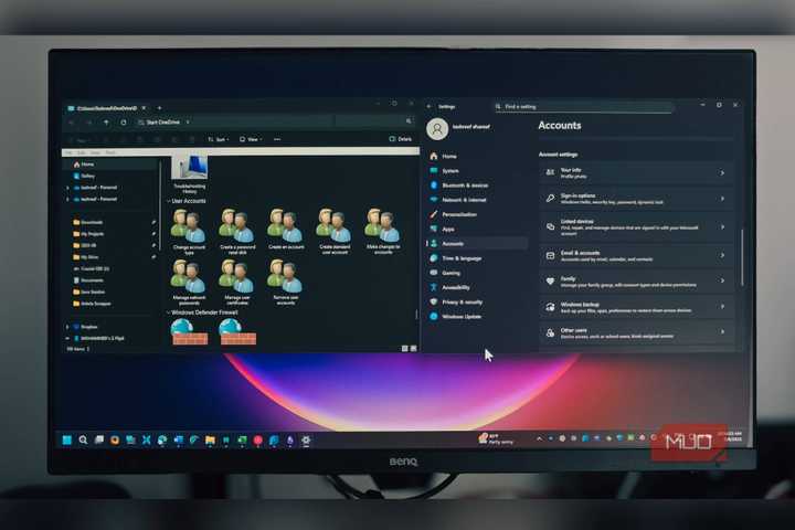 God Mode folder and the Settings app open on Windows 11 with a BENQ monitor