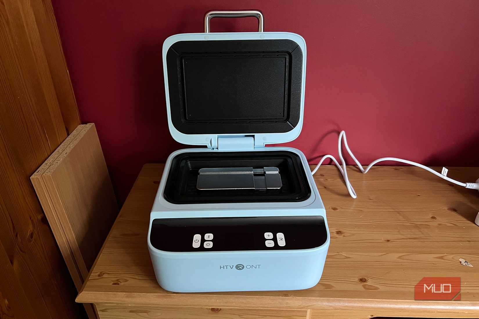 HTVRont phone Case Heat Press with universal phone holder inside.