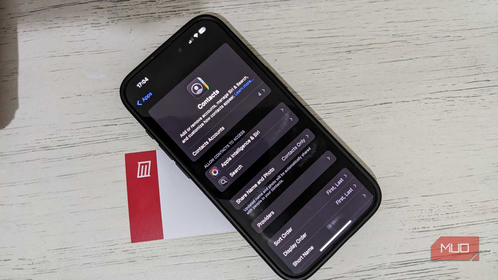 iOS Contacts App Above MakeUseOf Business Card