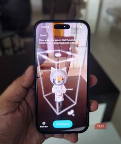 iPhone in hand 3d scanning a toy