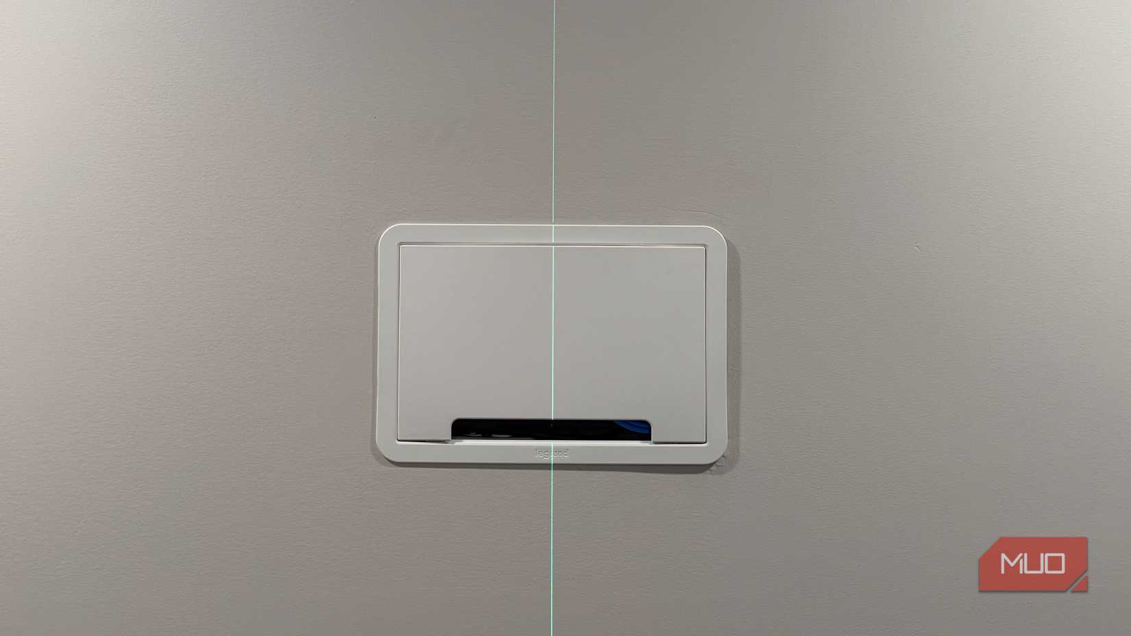 legrand recessed wall media box with green laser in center