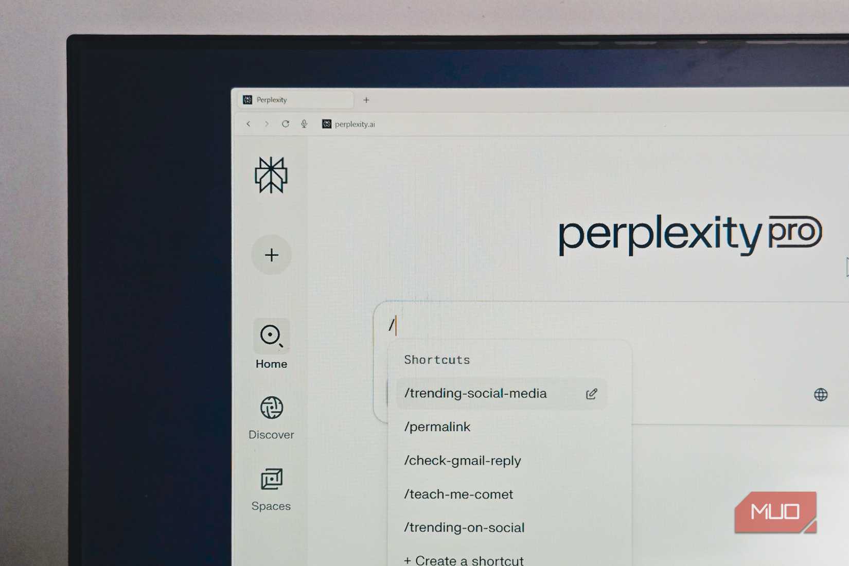Perplexity Comet browser open on a BENQ monitor