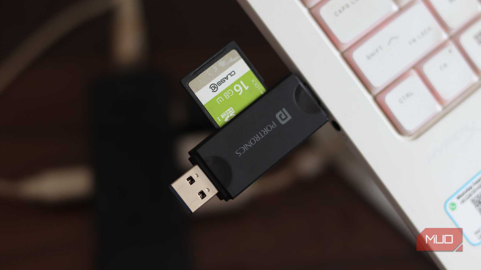 Portronics Mport 30 Plus plugged into a laptop. 
