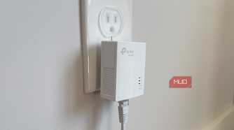 powerline adapter in bedroom plugged into wall socket