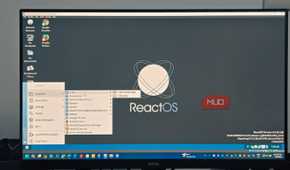 reactOS running in virtualbox open on a monitor