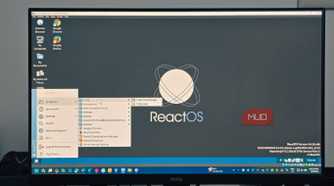 reactOS running in virtualbox open on a monitor