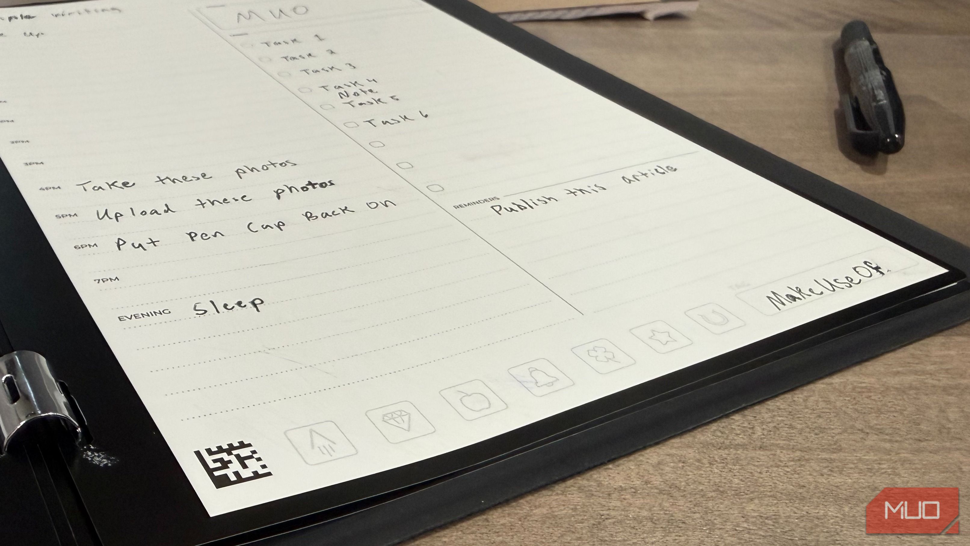 Rocketbook pro open on desk with erasable pen